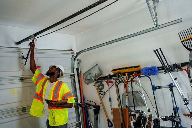 Professional Garage Door technician working in Ford Heights, IL